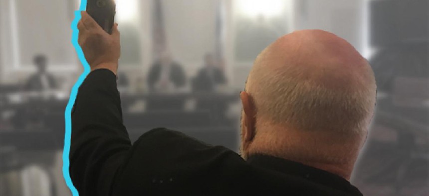 Monsignor Kevin Sullivan at a New York City Council hearing