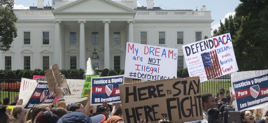 DACA supporters protest outside the White House.