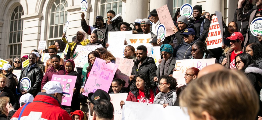 Nonprofits and elected officials rallied outside New York City Hall on Tuesday in support of “salary parity.”