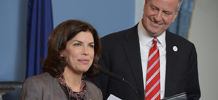 Julie Menin and Bill de Blasio at a press conference in New York City