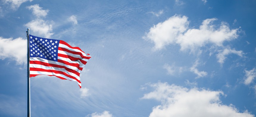 a sky and the U.S. flag