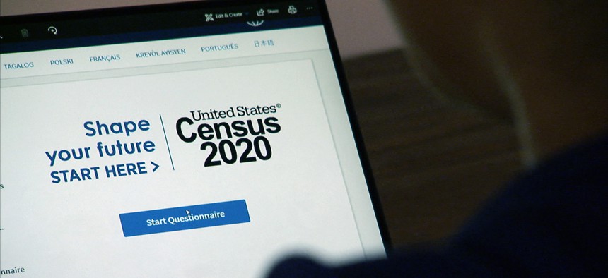 Person fills out 2020 census online.