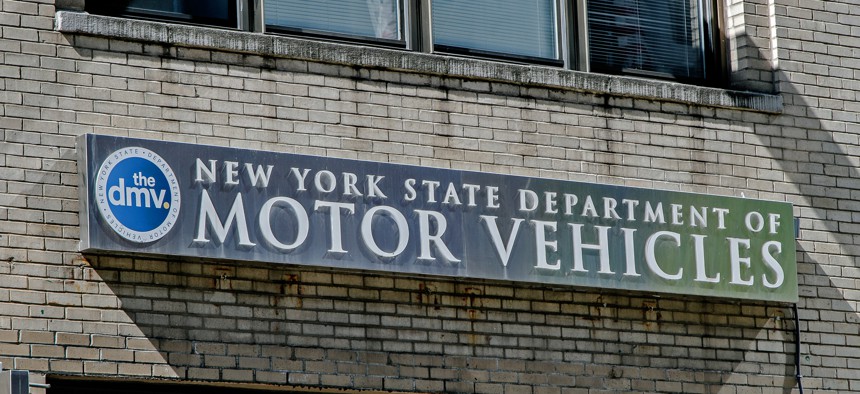 New York State Department of Motor Vehicles sign hangs over a Manhattan office.
