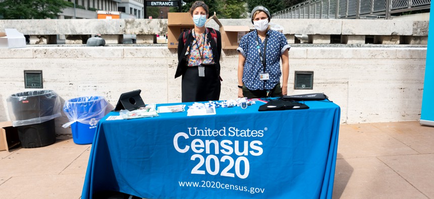U.S. Census workers stand outside Lincoln Center for the Performing Arts in September 2020.