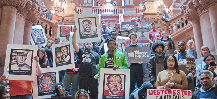 Photo of activists in New York who have advocated for bail reform under the hashtag #FreeNewYork, and at rallies like this one held in Albany in February 2018
