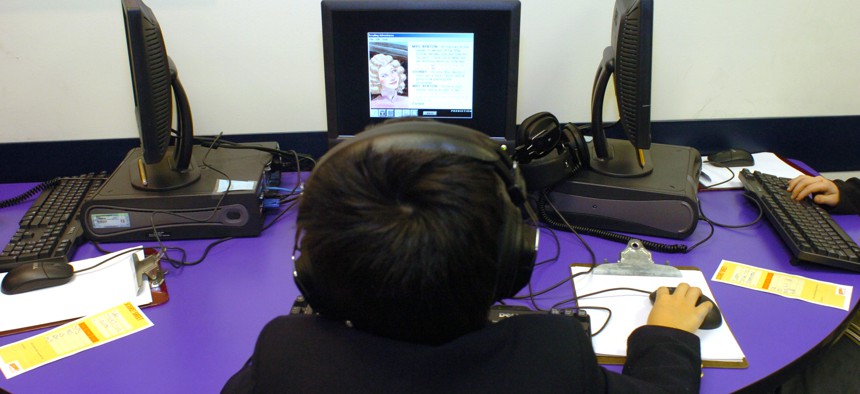 A New York City fourth grade student sit at their computer during an after-school learning program on at the SCORE! Educational Center in Manhattan earlier this year.