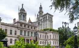 New York City Hall with the Manhattan Municipal Building in the background. 