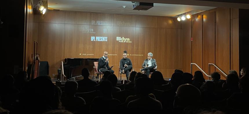 Anand Giridharadas (far right) and Maurice Mitchell (center) joined Dorian Warren, co-president of Community Change and co-founder and co-chair of the Economic Security Project for a discussion at the Brooklyn Public Library Feb. 28.