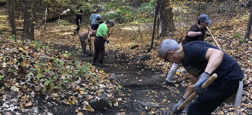 Natural Areas Conservancy volunteers known as Trail Maintainers are pictured working in Van Cordlandt Park in the Bronx