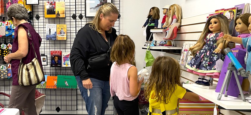 Shoppers at the Aug. 29 opening of a store at the Palisades Center Mall that features merchandise from the nonprofits BRIDGES and Yes She Can. 