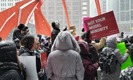 AAPI community members attend the Young Women's March Rally at the Chicago Federal Center Plaza on January 19, 2019. 