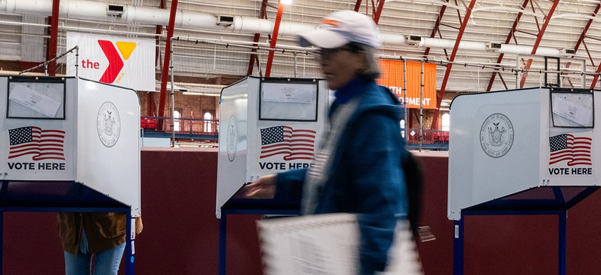 New Yorkers participate in early voting at a polling site in Brooklyn on Tuesday. 