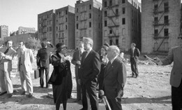 President Jimmy Carter stands in front of burned buildings in the South Bronx in 1977.